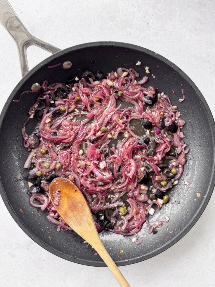 Sautéed onions, garlic, anchovies, chili flakes, capers and olives.