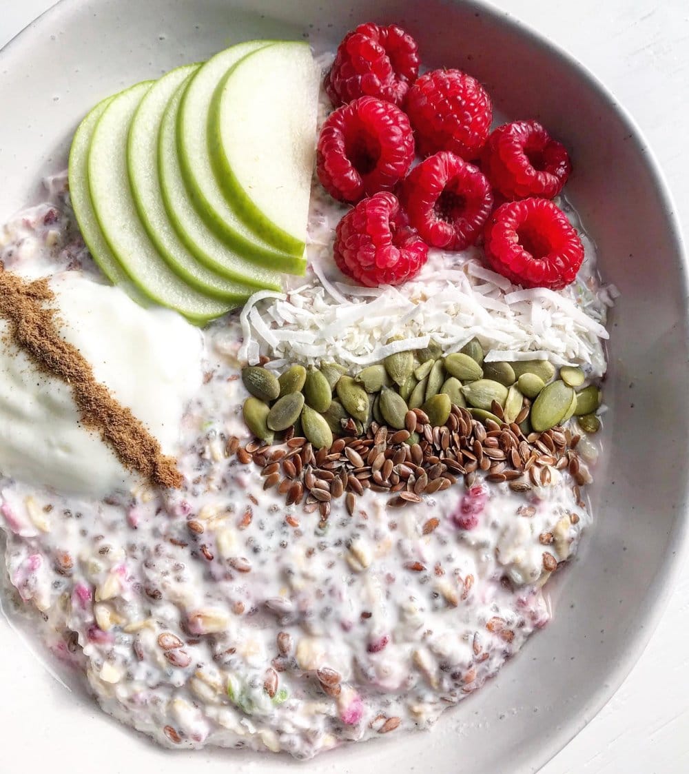 Close up of bircher muesli toppings.