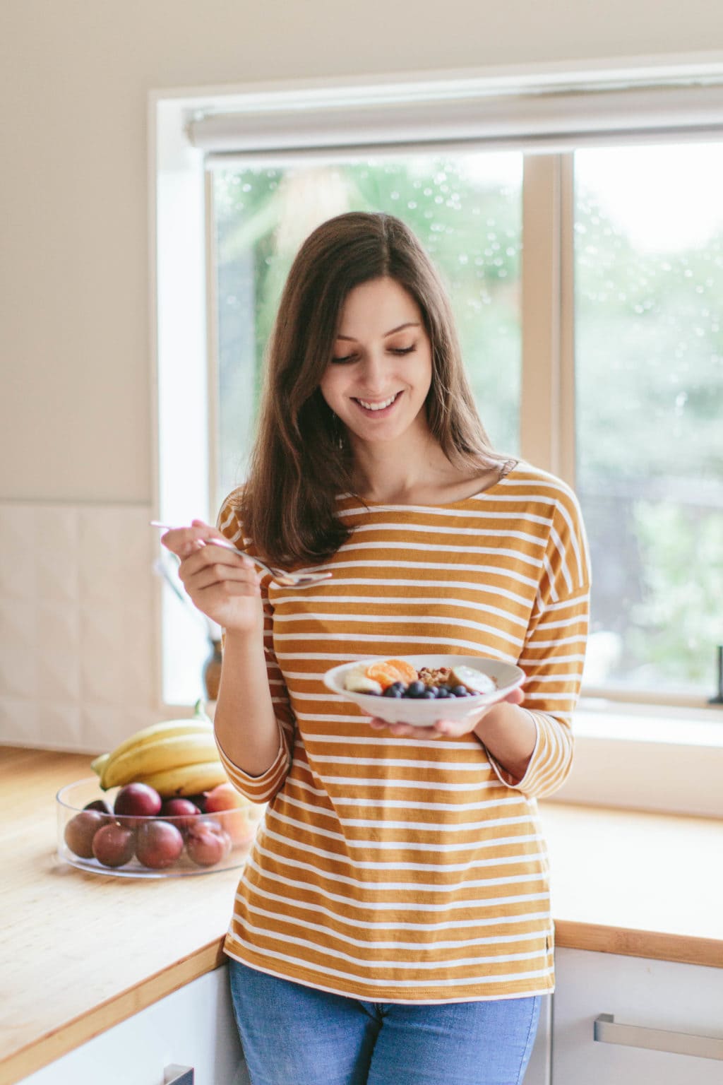 Danijela about to eat muesli and fruit.