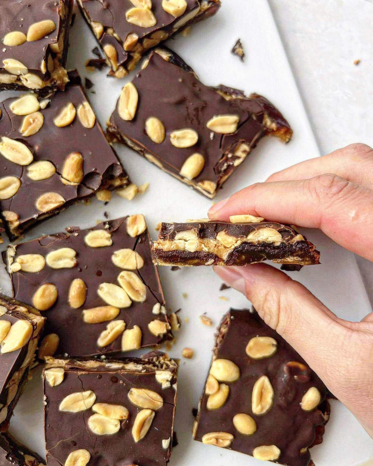 Peanut date bark sliced into squares