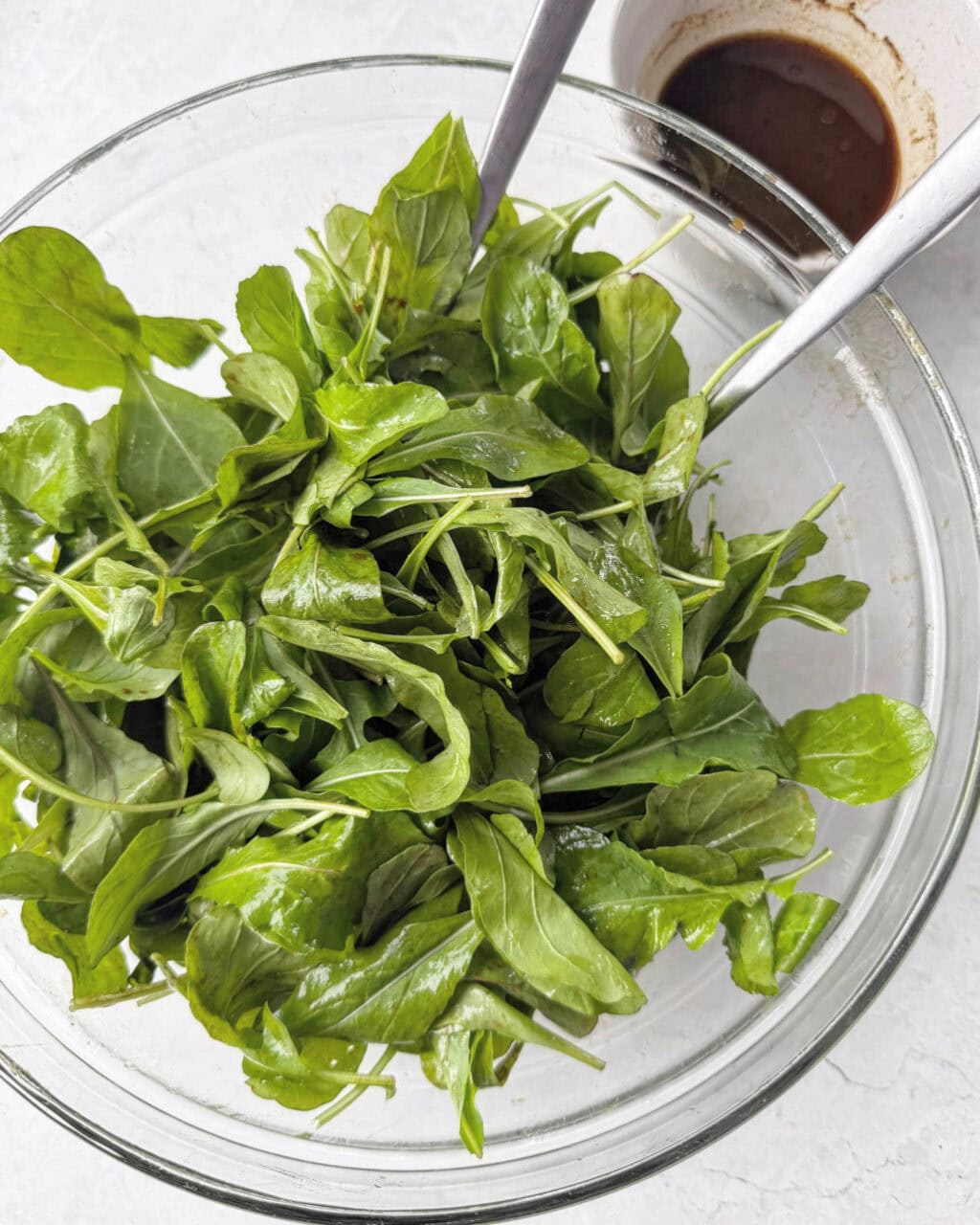 Fresh rocket tossed with balsamic dressing