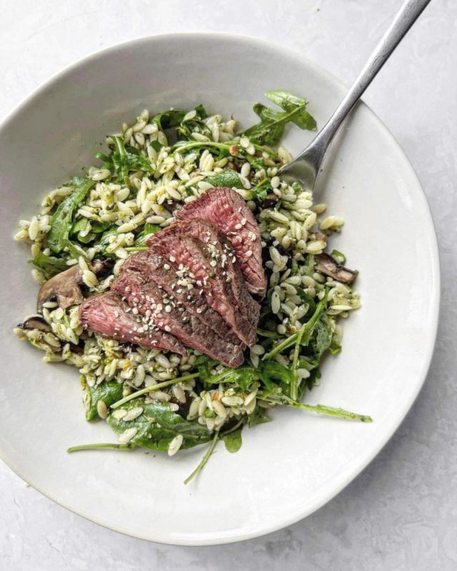 Spring pesto orzo salad with BBQ venison and mushrooms🌱🥩

We whipped this up for dinner this week and are obsessed! It’s packed with flavour, easy to make and nutritious to boot. 

It’s @nzvenison BBQ week, so the perfect time to enjoy some grass-fed farm-raised Kiwi venison. Nutritionally, venison is an excellent source of lean protein, as well as minerals iron, potassium and zinc💪

Here’s the recipe:

Ingredients
60g spinach 
½ cup frozen peas
¼ cup almonds 
1 lemon, zest and juice
1 clove garlic
¼ cup olive oil
Salt and pepper, to taste
2 cups rocket
1 cup orzo
A handful of flat-leaf parsley 
BBQ venison and mushrooms
500g grass-fed venison medallions
8 portobello mushrooms, medium
2 tsp hemp seeds

Method
Boil a small pot of water on the stove top. Add spinach and peas and cook for a few minutes. 

Drain and add to a food processor, along with the almonds, lemon and garlic. Blitz until finely chopped. With the motor running, slowly add the oil. 

Cook the orzo to packet instructions. Drain and keep aside.

Fire up the BBQ. Oil the medallions, and salt and pepper both sides. Oil the mushroom. Fry the medallions for 2-3 minutes each side, or until down to your likeness. Fry mushrooms on BBQ until cooked.

Allow meat to rest covered for five minutes. Slice mushrooms. Add to a bowl the orzo, pesto, rocket and mushrooms and mix well. 

Slice meat across the grain. Divide salad between bowls and top with venison and a sprinkle of hemp seeds.

#NZVenisonBBQWeek #venison #venisonrecipes #venisonsausage #dinnerideas #healthydinnerideas