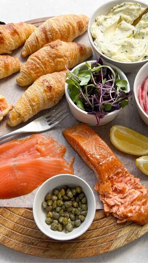Salmon Croissant Brunch Board🥐

A low-key, but seemingly fancy, brunch idea💃. Featuring a speedy lemon and herb cream cheese, honey pickled red onions and both @regalsalmonnz cold and hot smoked salmon, this one’s a total crowd pleaser. 

Here’s the recipe:

Ingredients:
Honey Pickled Red Onion
1 red onion
½ cup vinegar
½ cup water
1 ½ Tbsp honey
1 tsp salt
Lemon and Herb Cream Cheese
125g spreadable cream cheese 
2 Tbsp finely chopped fresh herbs (e.g. chives, basil)
1 lemon (zest and 1 Tbsp juice)
Big pinch of salt 

To serve
6 petite croissants 
100g Regal Cold Smoked Salmon Slices
100g Regal Hot Smoked Salmon - Classic
½ cup micro radish mix
2 Tbsp capers 
Lemon wedges

Method:
Finely slice the red onion. In a jar, combine warm water, vinegar, honey, and salt. Secure the lid and shake well until the honey dissolves. Add the red onion and submerge it under the brining mixture. Pickle for 30 minutes.

Use a hand mixer to blend together the ingredients for the lemon and herb cream cheese until thick and creamy.

Place croissants on a serving board. Arrange cream cheese, pickled red onions, and capers in their own serving bowls, and place on the board. Add smoked salmon and lemon wedges.
#easterbrunch #easterbreakfast #crossiant #smokedsalmon